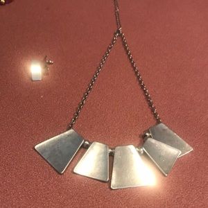 Silver toned necklace has a few imperfections On silver see pics